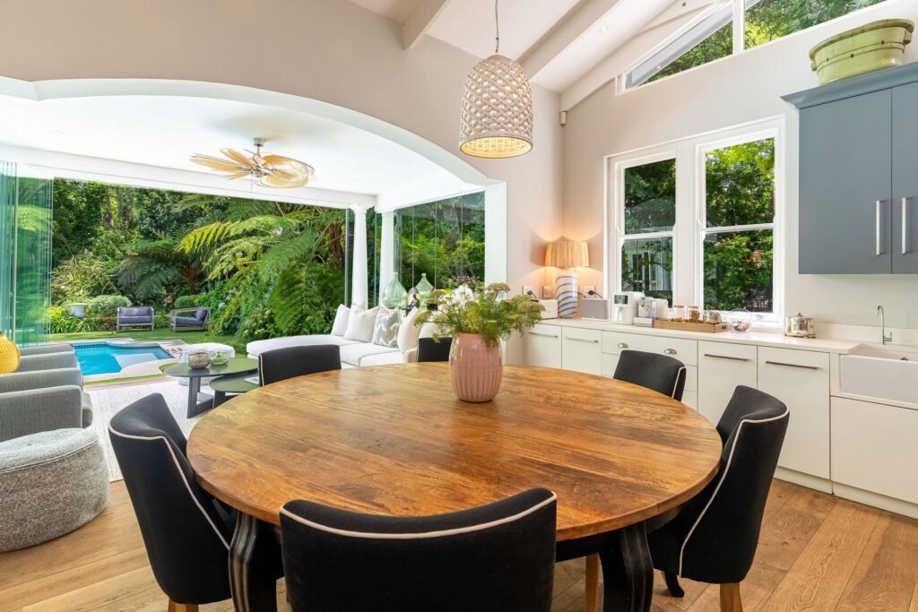 The dining room at Alphen Retreat in Constantia, opening onto the pool